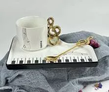 Чашка с блюдцем и ложкой PIANO